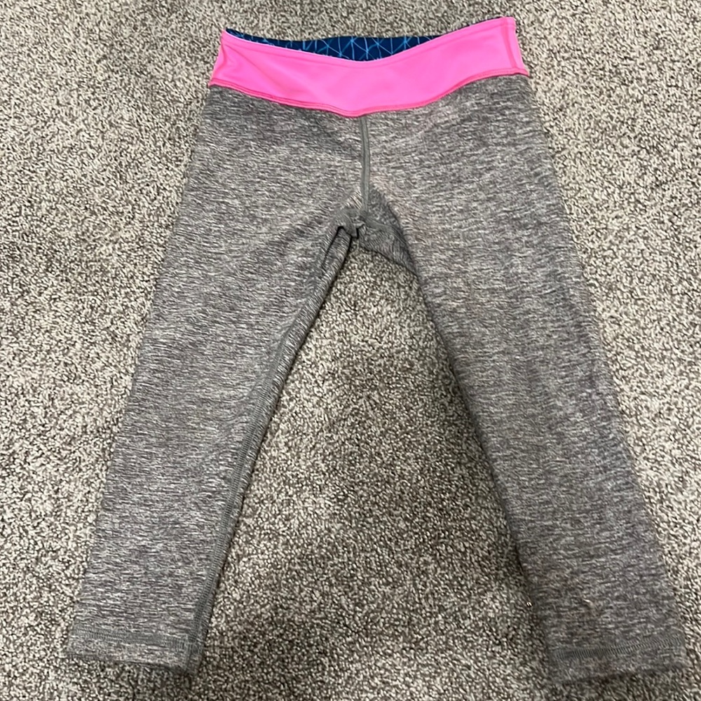 Ivivva grey Capri leggings with a reversible waist band, and a girls size 8.